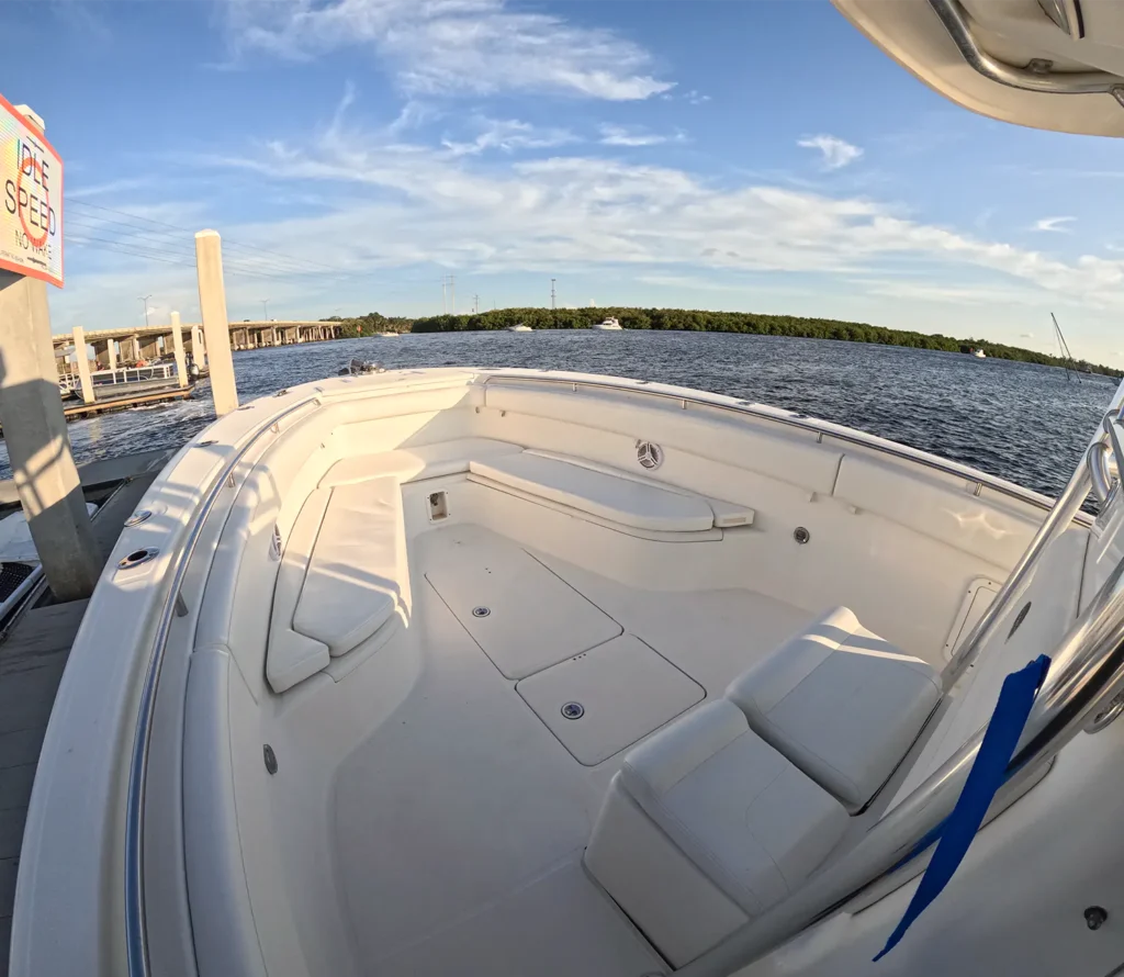 Boat seating area with deep cushions.