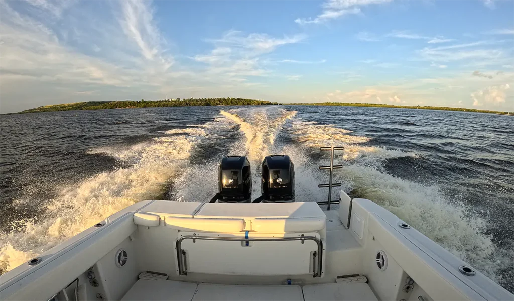 View looking rearward at wake as boat moves foward